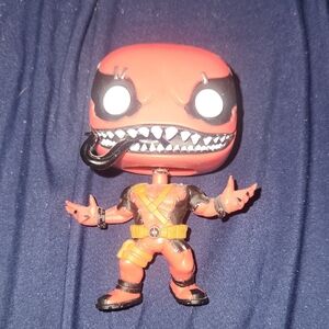 Funko Pop Red and Black Figure with Orange Accents